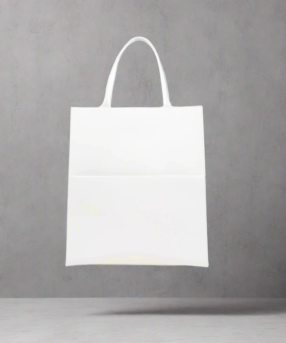 White paper bag on a white background