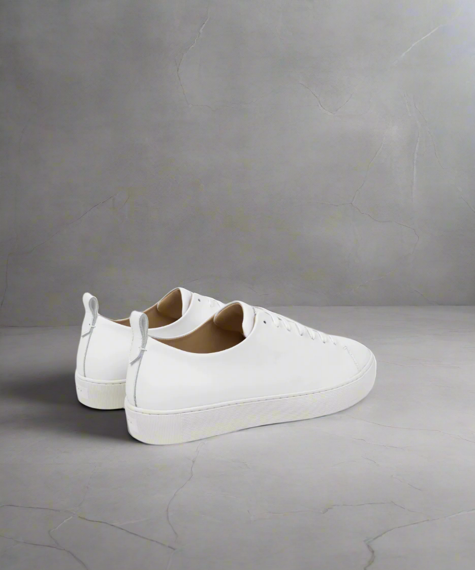 White sneakers on a GRAY background