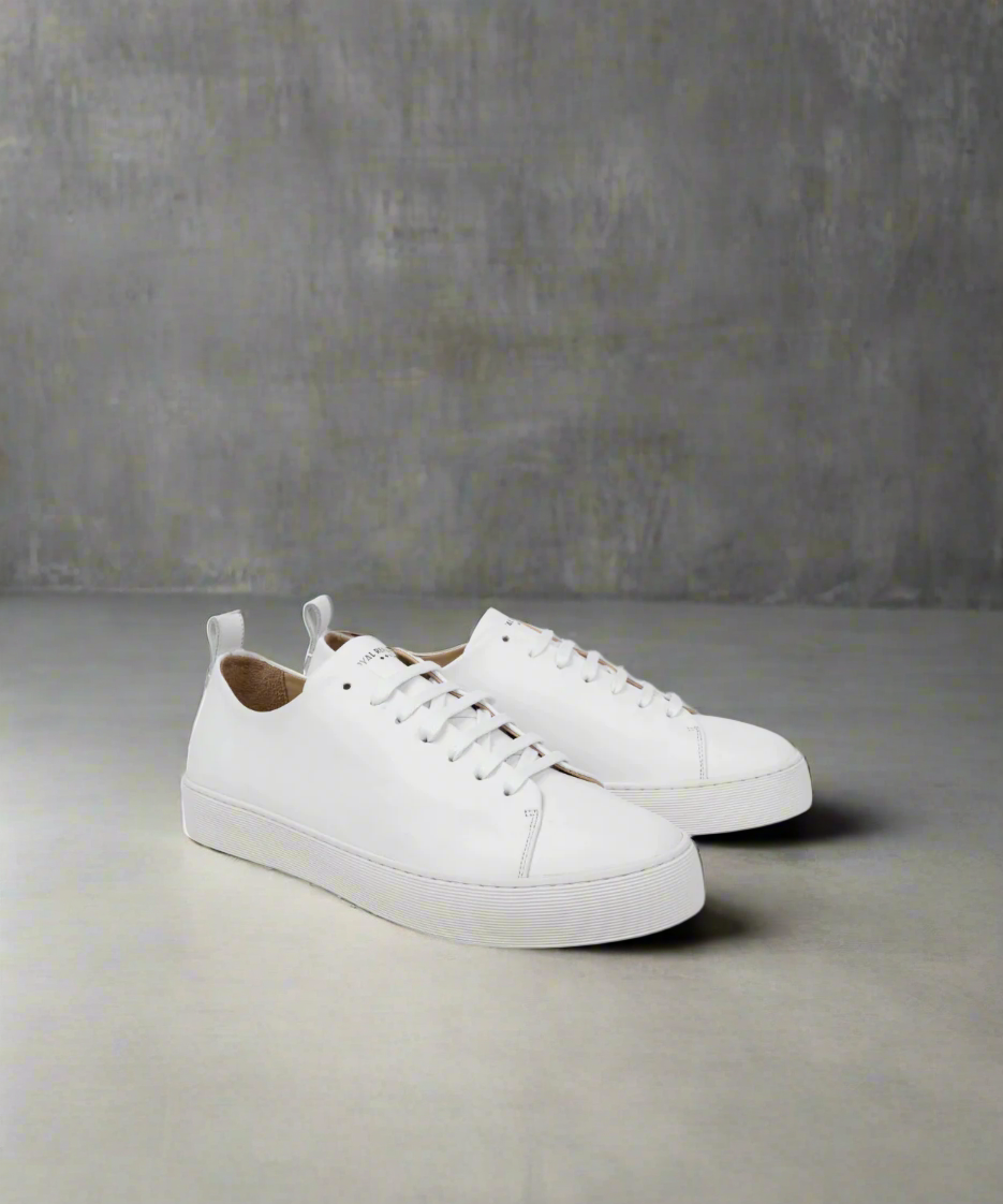 White sneakers on a white background