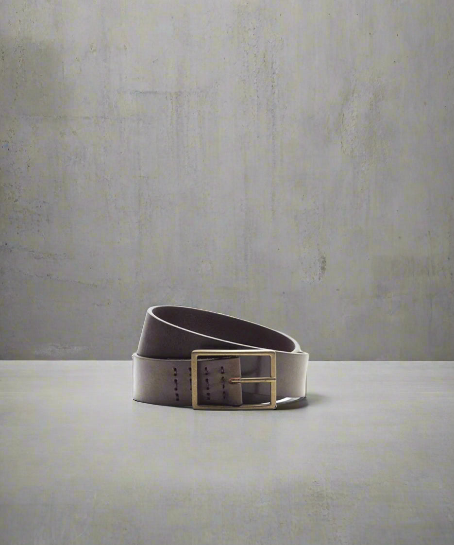 Gray leather belt with a gold buckle on a light gray background