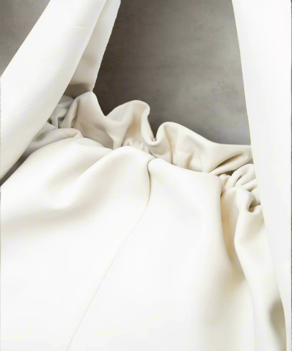 Close-up of white fabric with a grau background