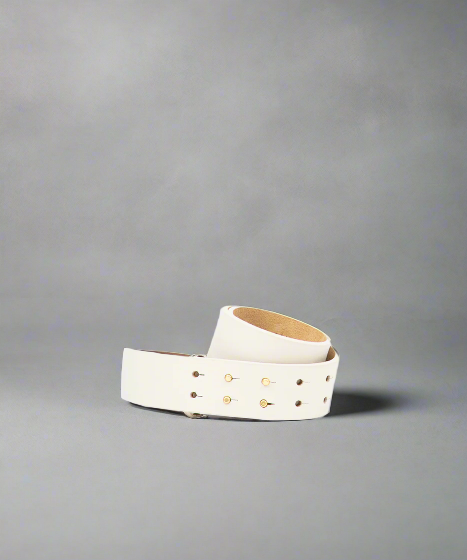 High waist belt with mushroom pins closure, displayed against a gray background.