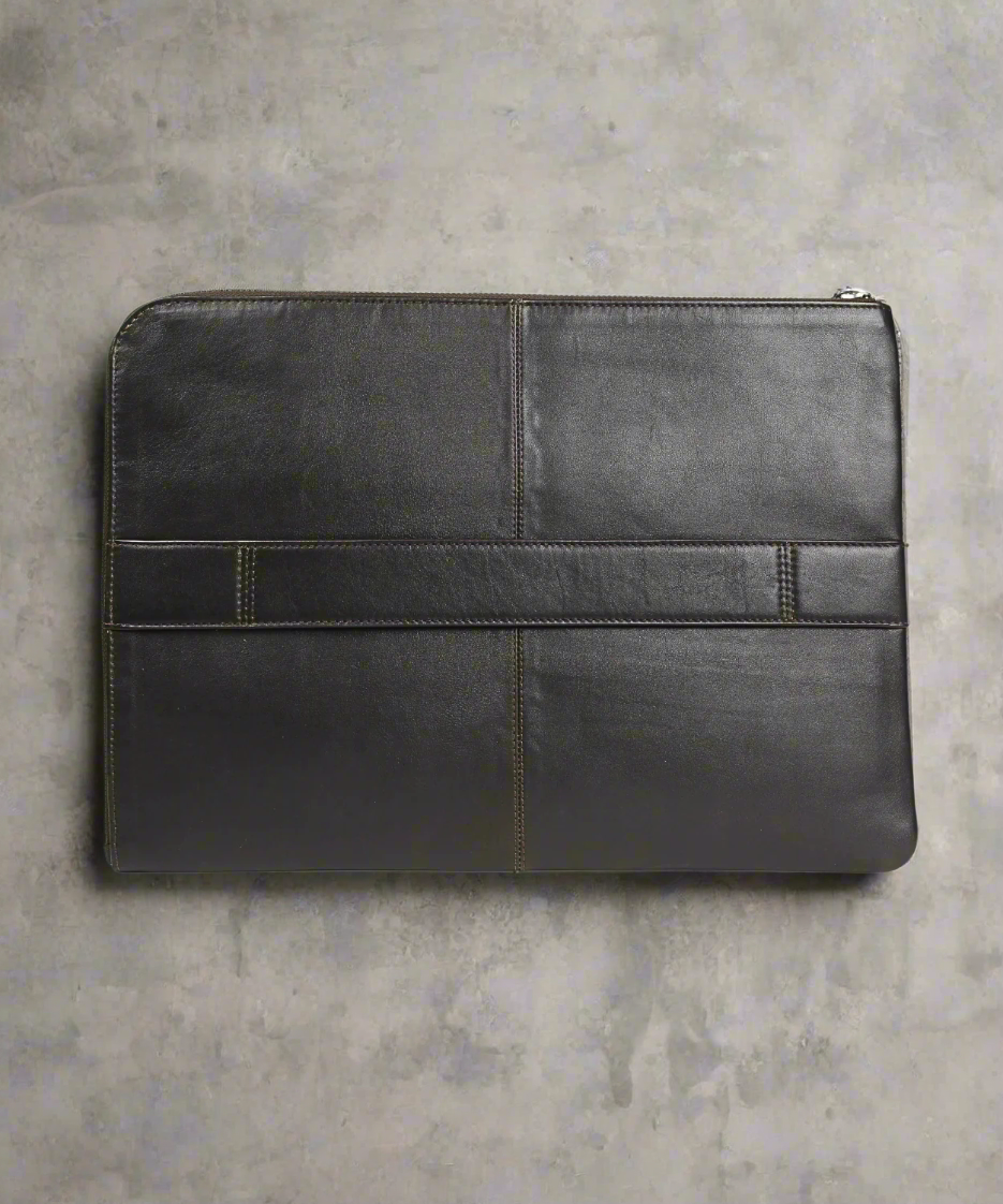 Black leather tablet case on a gray background