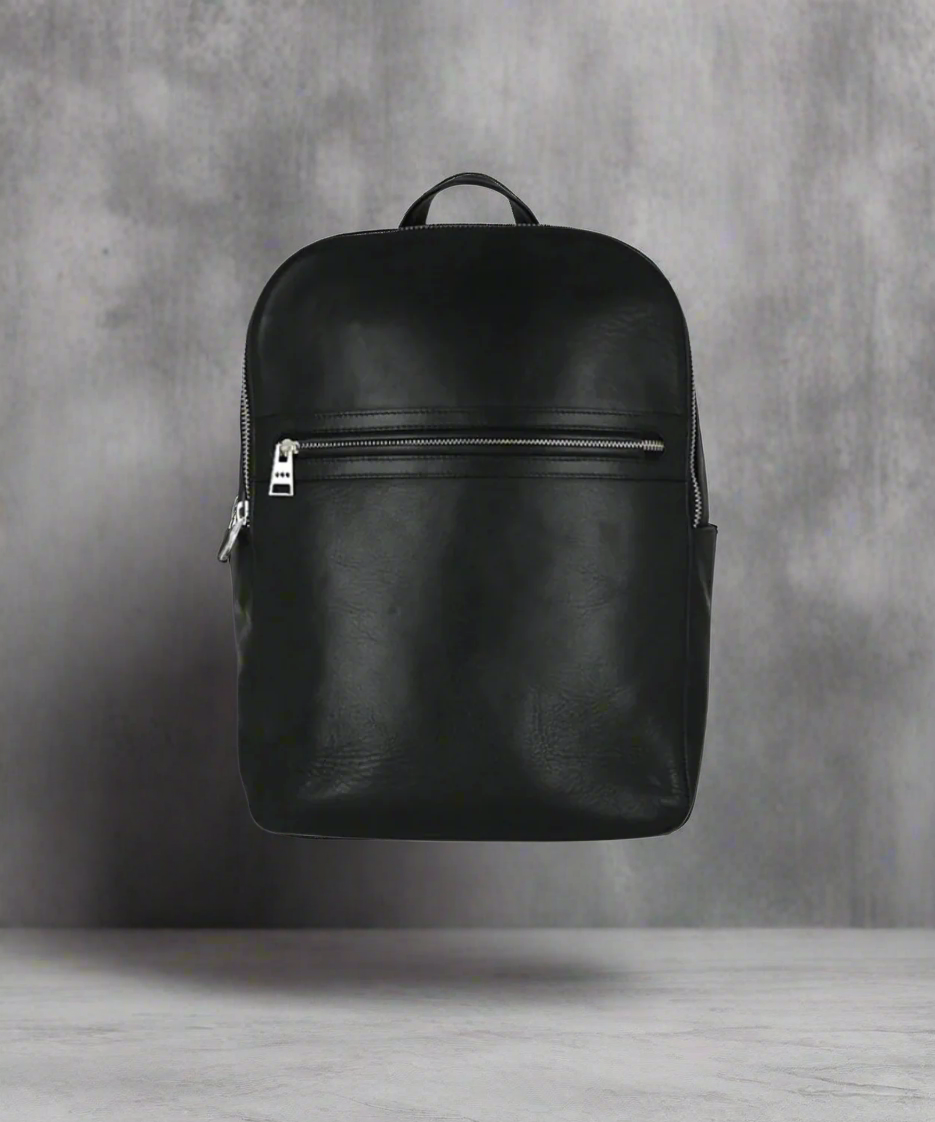 Black backpack on a white background