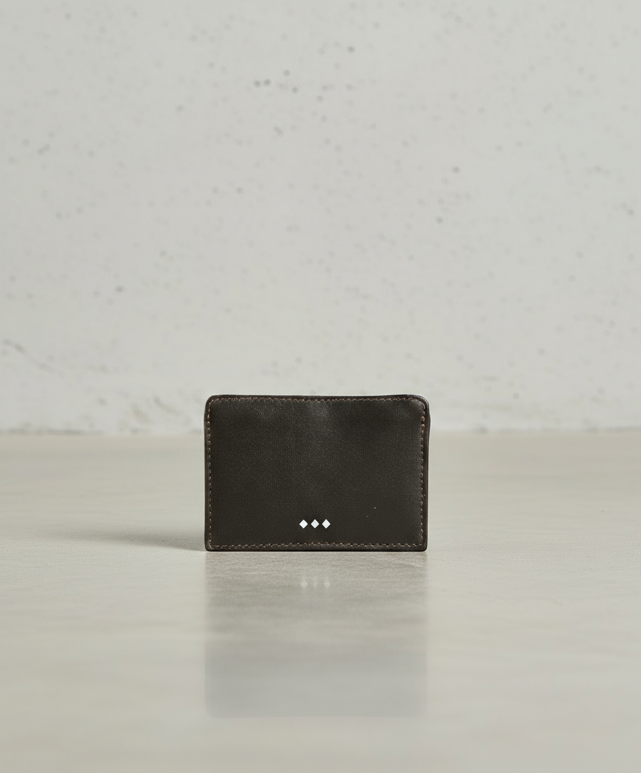 Brown leather wallet with brand logo on a Gray background