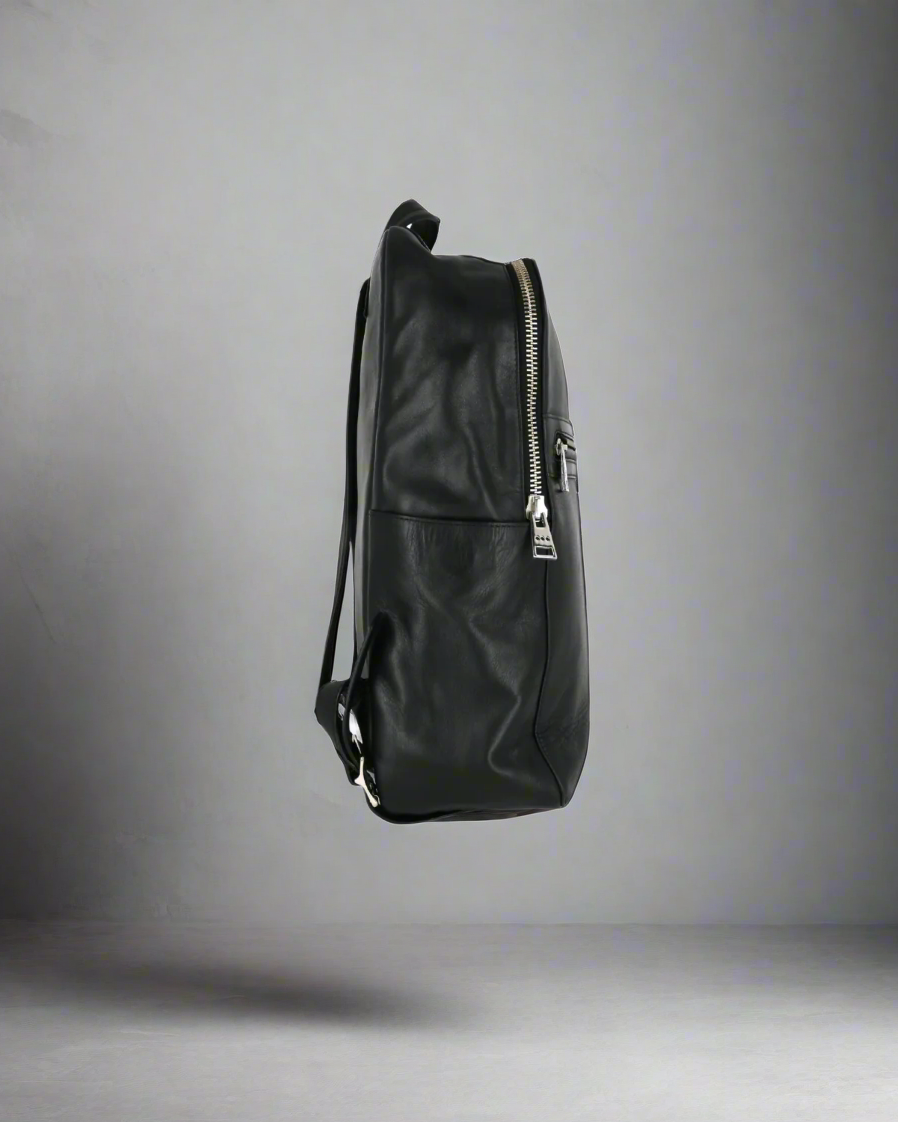 Black leather Royal RepubliQ backpack on a white background