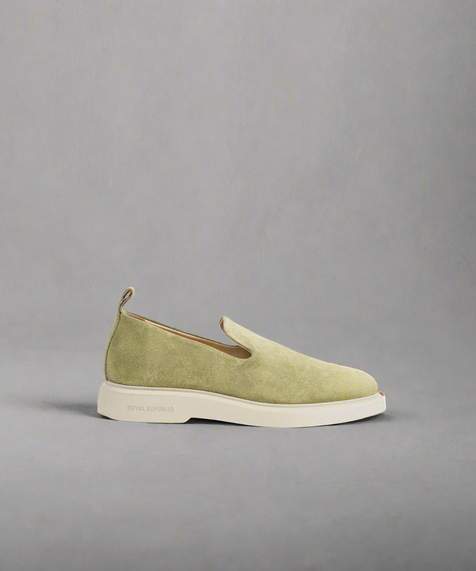 A green Royal RepubliQ Bunk Minimal Loafer for men, featuring a minimalist design with a green suede upper and a ecry-off white outsole.